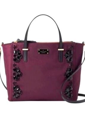 kate spade plum tote with black handles and jeweled accents